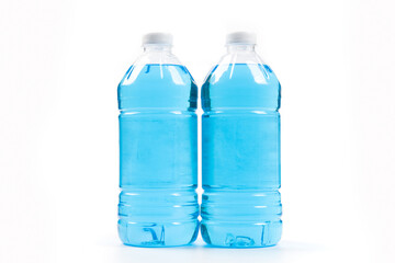 bottle of blue windshield washer fluid isolated on white backgrond