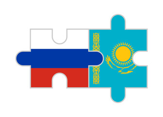 Obraz premium puzzle pieces of russia and kazakhstan flags. vector illustration isolated on white background