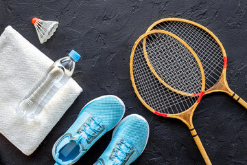 Sports equipment set with badminton rackets and sneakers