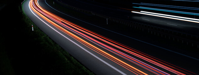 Fototapeta na wymiar lights of moving cars at night. long exposure