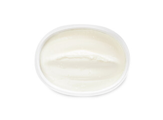 Plastic container of tasty cream cheese isolated on white, top view