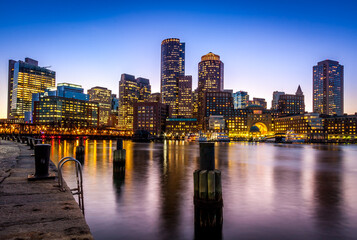 Naklejka premium Boston in Massachusetts, USA at Boston Harbor and Financial District.