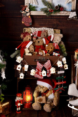 Vintage style Christmas decorations with teddy bears in suitcase
