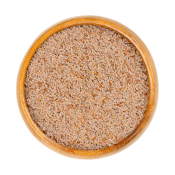 Whole Psyllium Seeds, In A Wooden Bowl. Plantago Ovata, Known As Blond Plantain, Desert Indianwheat, Blond Psyllium, And Ispagol. Common Source Of Psyllium, A Type Of Dietary Fiber And Food Thickener.