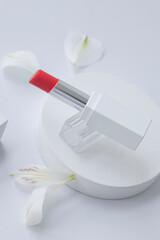 A red lipstick isolated on white background.