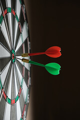Concept of competition and goal achievement.Achieving goals in business and life.Dartboard with two...