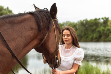 Walk with a horse near the river