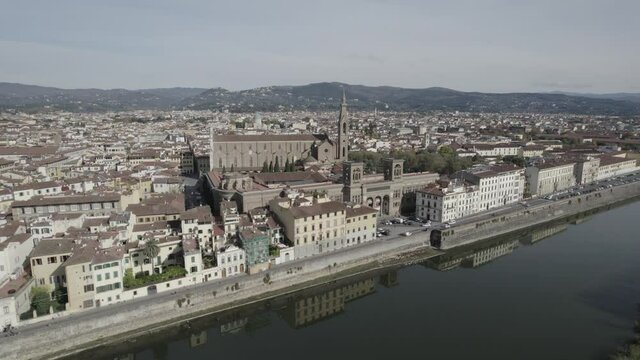 Aerial footage video near river - panoramic view of Florence	