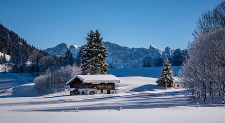 Alpine hut in an idyllic winter landscape in Austria, Heutal, Unken, Salzburger Land, Austria