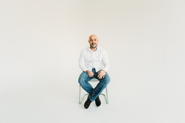 a young man, business, sociable speaker, businessman, says something with gestures. in the studio...