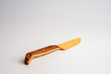 Wooden knife isolated on white background with clipping path. Above view.