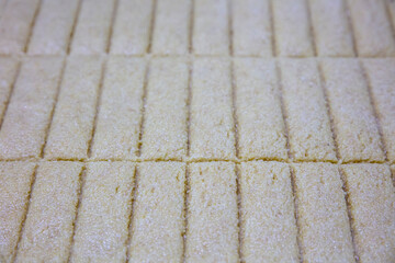 Turkish Dessert Sambali or Damascus Dessert (Sam Tatlisi). Sweet Bali of Damascus in on the tray.