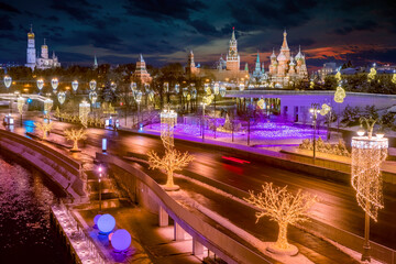Naklejka premium Moscow. Russia. The streets of Moscow. Christmas garlands on the trees. Illumination on a night street. Excursions in the evening Moscow. Christmas holidays in Russia. New Year's tour to the capital