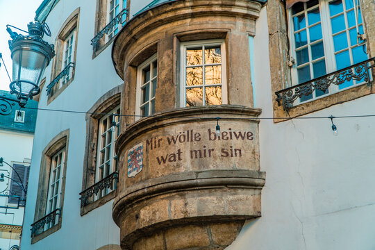 Translation - we want to remain what we are - Luxembourg national motto on medieval houses in Luxembourg City