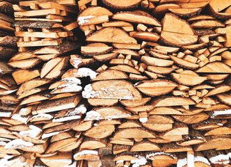 a woodpile of sawn wood in close-up
