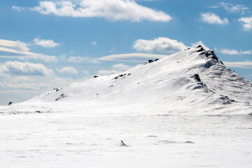mountain top and slope in the snow