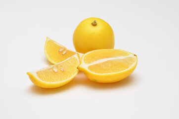 fresh appetizing lemons on a white background, selective focus
