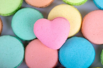 Fototapeta na wymiar Sweet colored macaroon for a gift to Valentines Day