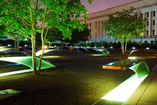 Memorial benches are illuminated at the 9/11 Memorial at the Pentagon honoring those killed in the terrorist attacks on September 11