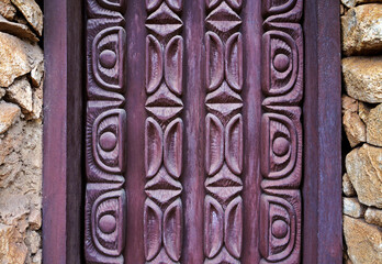 Carved wooden door detail, Tiradentes, Minas Gerais, Brazil