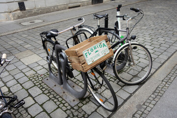 Fototapeta na wymiar Bicycle on a cobblestone street in a German town
