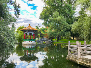 Temple of china garden with lake in zurich - obrazy, fototapety, plakaty