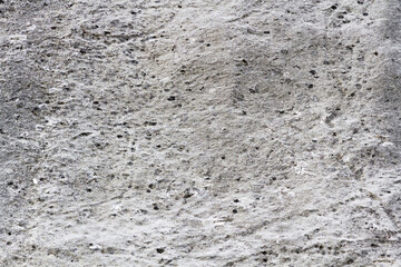 Gray limestone rock vertical wall background 