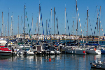 Fototapeta na wymiar View of Ayamonte (Spain) from the port with boats of Vila Real de Santo Antonio (Portugal)