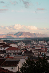 Beautiful shot of the cityscape of San Jose with mountains in the background during the sunset