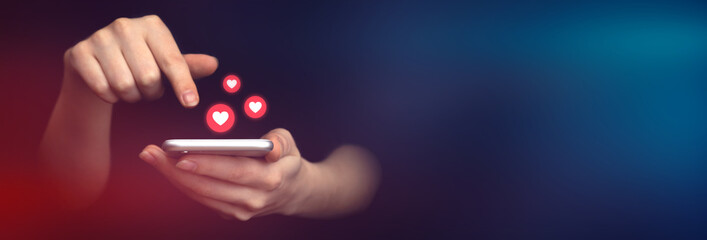 Social media concept, banner. Hands using smartphone with like notification icons. Social...