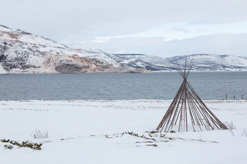 Sami lavvo on the seashore