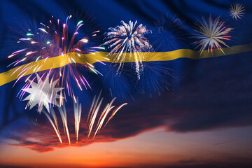 Fireworks in evening sky and flag of Nauru