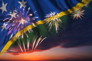Fireworks in evening sky and flag of Solomon Islands