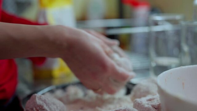 Girl in red longsleeve to cook minced meat cutlets from fresh mea