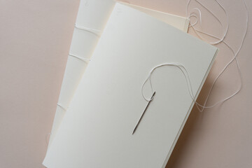 bookbinding - signatures with needle and thread