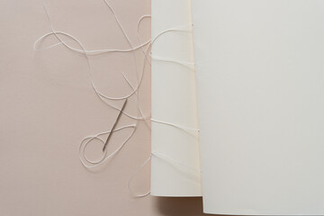 bookbinding - signatures with thread and needle