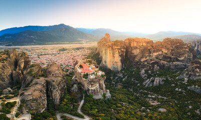 Aerial view over Meteora, a rock formation in central Greece hosting one of the largest most precipitously built complexes of Eastern Orthodox monasteries. Kalampaka, Greece, Europe