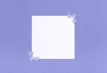 Christmas mockup with silver snowflakes on violet background. Color of the year 2022 Very Peri. Happy New Year. Winter concept. Space for text.