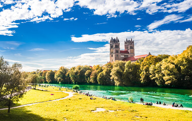 View on summer landscape by St. Maximilian church and Isar in Munich