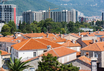 Panoramic cityscape of The Old Town of Budva, Montenegro, beautiful top view of Adriatic Sea and the Balkan Mountains