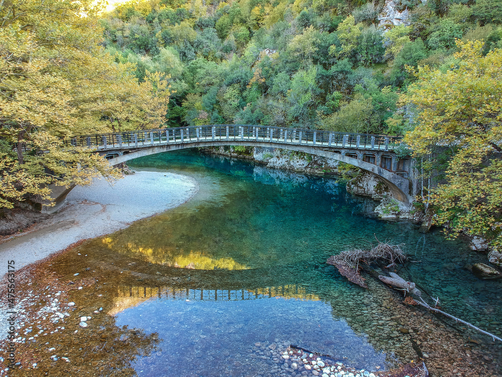 Wall mural scenic view over the natural beauty at the famous voidomatis river passing from the national park of