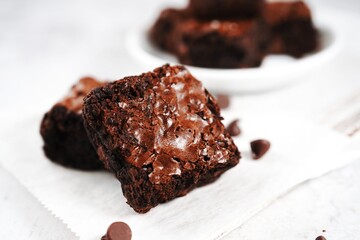 Homemade classic crinkle top fudge brownies, selective focus