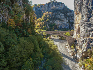 The beautiful old stone bridge known as Kokkoris or Noutsios bridge, near Ioannina town, Epirus Greece.