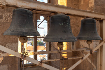 Obraz premium The bells in the tower of Saint George's Cathedral in Jerusalem, Israel 