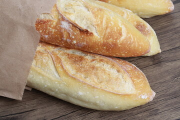 Several baguettes of bread on a table