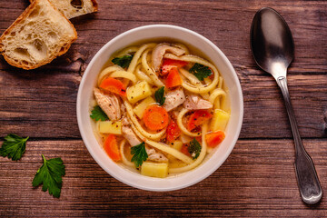 Chicken soup with noodles and vegetables