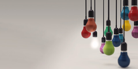 Glowing 3d Light Bulb between the others on a grey light background. Leadership, innovation, great idea and individuality concepts. 3d rendering.