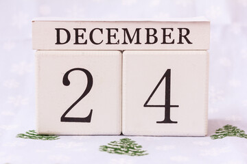 Save the date. December 24th. Christmas Eve, date calendar  and small Christmas trees on white...