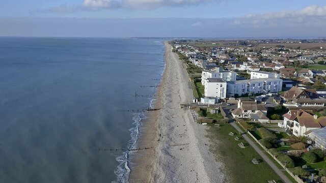 East Wittering seafront a popular resort for tourists in the summer and situated in West Sussex Southern England, Aerial video.