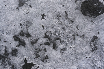 Cold freezing temperature during winter shows ice texture closeup with shallow depth of field.